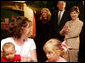 Mrs. Laura Bush waves to visitors during a tour of Cinergy Children’s Museum in Cincinnati, Ohio, Wednesday, October 11, 2006. Ranked among the world’s top 25 children museums, Cinergy Children's Museum offers more than 1,800 hours of programming for children in areas such as arts, culture, reading and science. White House photo by Shealah Craighead