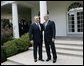 President George W. Bush walks with Kazakhstan President Nursultan Nazarbayev out to the Rose Garden at the White House, Friday, Sept. 29, 2006, following their meeting in the Oval Office. White House photo by Eric Draper