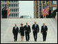 President George W. Bush and Laura Bush walk with New York City Mayor Michael Bloomberg, far left, New York Governor George Pataki, second from right, and former New York City Mayor Rudolph Giuliani down the entrance ramp to Ground Zero at the World Trade Center site in New York City Sunday, Sept. 10, 2006. White House photo by Kimberlee Hewitt