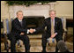 President George W. Bush and Kazakhstan President Nursultan Nazarbayev shake hands during their meeting Friday, Sept. 29, 2006 in the Oval Office at the White House. White House photo by Eric Draper