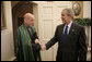 President George W. Bush welcomes President Hamid Karzai of Afghanistan to the Oval Office Tuesday, Sept. 26, 2006. White House photo by Eric Draper