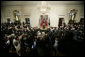 President George W. Bush addresses invited guests, members of the media and White House staff Wednesday. Sept. 6, 2006 in the East Room of the White House, as he discusses the administration's draft legislation to create a strong and effective military commission to try suspected terrorists. The bill being sent to Congress said President Bush, "reflects the reality that we are a nation at war, and that it is essential for us to use all reliable evidence to bring these people to justice." White House photo by Kimberlee Hewitt