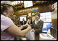 Mrs. Laura Bush makes a purchase at Franklin Cider Mill in Franklin, Mich., Thursday, Sept. 28, 2006. The mill dates back to 1837, the year Michigan was admitted to the Union. White House photo by Shealah Craighead