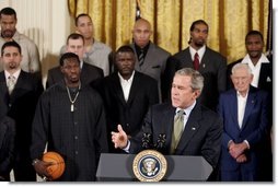 President George W. Bush congratulates the Detroit Pistons on winning the 2004 NBA Championship during a ceremony in the East Room of the White House, Monday, Jan. 31, 2005.  White House photo by Paul Morse
