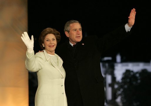 President George W. Bush and Laura Bush arrive on stage for a fireworks display during the inaugural concert 'A Celebration of Freedom' on the Ellipse south of the White House, Wednesday, Jan. 19, 2005. White House photo by Eric Draper