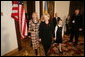 Lynne Cheney walks with Mrs. Viktor Yushchenko during a meeting in Krakow, Poland, Jan. 26, 2005. White House photo by David Bohrer