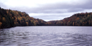 Chapel Lake is shown with fall colors, a beautifu view of the northwoods in Pictured Rocks National Lakeshore.