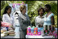 Mrs. Laura Bush is introduced to a participant in the micro-credit program developed at the GHESKIO HIV/AIDS Center’s women’s clinic, Thursday, March 13, 2008, in Port-au-Prince, Haiti. The program was initiated to help improve the lives of HIV patients. White House photo by Shealah Craighead