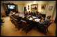 President George W. Bush participates in a video teleconference with Afghanistan Provincial Reconstruction Team Leaders and Brigade Combat Commanders Thursday, March 13, 2008, in the Roosevelt Room of the White House. White House photo by Eric Draper