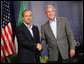 President George W. Bush exchanges handshakes with Mexico's President Felipe Calderon Monday, Aug. 20, 2007, as they met for a bilateral discussion during the North American Leaders' Summit in Montebello, Canada. White House photo by Eric Draper