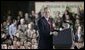 President Bush smiles broadly while addressing troops Wednesday, Feb. 24, 2005, at Wiesbaden Army Air Field in Wiesbaden, Germany. White House photo by Paul Morse