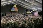 President Bush is nearly lost in a sea of camouflage as he addresses troops Wednesday, Feb. 24, 2005, at Wiesbaden Army Air Field in Wiesbaden, Germany. White House photo by Paul Morse