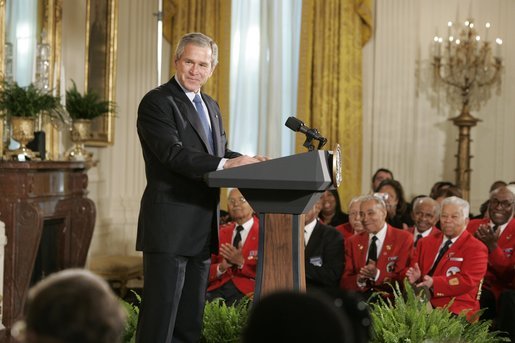 President George W. Bush speaks during a ceremony honoring African American History Month Tuesday, Feb. 8, 2005. "In the 1920s, Dr. Woodson argued that if African Americans were to take their rightful place in society, young Americans of all races needed to learn about the black contribution to our history and culture. So in 1926, he launched the first black history week. Today, a movement that began in black churches and schoolrooms is observed all across America -- including the White House. Welcome," said the President. White House photo by Paul Morse