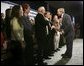 President George W. Bush greets audience members at the end of the Town Hall on Strengthening Social Security at the Tampa Convention Center in Tampa, Florida, Friday, Feb. 4, 2005. 