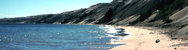 A peaceful beach on Grand Sable Lake near Grand Marais, Michigan, in Pictured Rocks National Lakeshore.