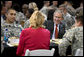 President George W. Bush talks with U.S. troops and their families over lunch during his visit to Fort Benning, Ga., Thursday, Jan. 11, 2007. White House photo by Eric Draper