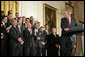 President George W. Bush looks back to MVP David Eckstein during his remarks honoring the St. Louis Cardinals, who won the 2006 World Series Championship, in the East Room Tuesday, Jan. 16, 2007. White House photo by Eric Draper