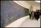 Mrs. Laura Bush tours the Musee de l’Orangerie with Director Pierre Georgel, right, and US Ambassador Craig Stapleton and his wife Mrs. Stapleton, left, in Paris Monday, Jan. 15, 2007. The Musee de l’Orangerie recently underwent renovations and is home to eight paintings from Monet’s large-format series of Water Lilies. White House photo by Shealah Craighead