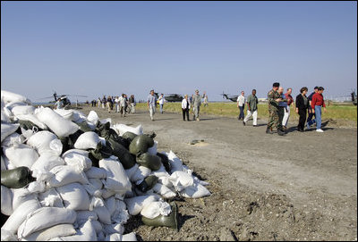 Vice President Dick Cheney and Mrs. Cheney tour the 17th Street levee repair operations in New Orleans, Louisiana during a recent visit to survey damage and relief efforts in the wake of Hurricane Katrina September, 8, 2005.