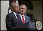 Standing with President George W. Bush, Rep. Porter Goss, R-Fla., addresses the media after the President nominated him to be the director of the CIA in the Rose Garden, Tuesday, Aug. 10, 2004.