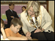 Secretary Spellings reads with students at Humboldt Park Charter School in Milwaukee, Wisconsin.  During the visit, Spellings presented an Early Reading First grant to Marquette University that will benefit students in the Milwaukee area.