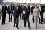 The Eiffel Tower stands tall in the background as Mrs. Laura Bush walks with Stephane Martin, President of the Musee du quai Branly, center, in Paris Monday, Jan. 15, 2007. Mrs. Bush toured the museum with US Ambassador Craig Stapleton, left, and his wife Mrs. Stapleton.