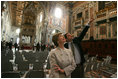 First lady Laura Bush is given a tour of St. John at the Lateran Church in Rome by art historian Dr. Stefano Aluffi-Pentini Thursday, April 7, 2005. The President and Mrs. Bush are in Italy for the scheduled Friday funeral of Pope John Paul II.