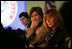 Mrs. Laura Bush listens to panel members during her participation is a roundtable discussion on the special needs of military youth and families Wednesday, Dec. 5, 2007, at the Learning Center at Andrews Air Force Base in Maryland.