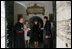 Mrs. Laura Bush shakes the hand of a Vatican official after visiting the tomb of Pope John Paul II Saturday, June 9, 2007, in Rome.