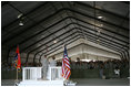 Mrs. Laura Bush delivers remarks to US troops during her visit to Bagram Air Force Base Sunday, June 8, 2008, in Bagram, Afghanistan.