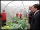 Secretary Paige tours the school's greenhouse.