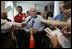 Vice President Dick Cheney meets with the press during a visit to the Austin Convention Center in Austin, Texas Saturday, September 10, 2005. The Vice President spent time visiting with families who have been relocated from their homes to the Convention Center, which has been designated as one of the many temporary shelters for Katrina Hurricane evacuees.