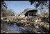 A house located in a Gulfport, Mississippi neighborhood was destroyed by the effects of Hurricane Katrina in the flood ravaged areas Thursday, September 8, 2005. The hurricane hit both Louisiana and Mississippi ten days prior, Monday, August 29th.