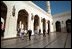 During his visit to Muscat, Oman, Vice President Dick Cheney passes under pointed arches and ornate engravings during a tour of the country's massive Grand Mosque, which spans an area of about 25 square miles, March 16, 2002.