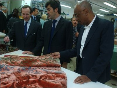 Secretary Paige admires fabrics in San Patrignano's textiles house. 