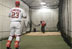 President George W. Bush and Washington Nationals catcher Brian Schneider warm up behind the scenes Thursday night at RFK Stadium.  The President threw out the ceremonial first pitch at the inaugural appearance of the baseball team.