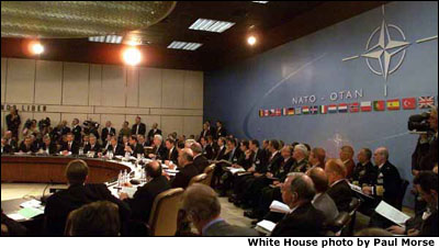 President George W. Bush speaks at the Secretary-General's office at NATO headquarters in Brussels, Belgium on June 13, 2001. White House photo by Paul Morse