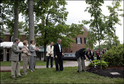 President George W. Bush and Australian Prime Minister John Howard participate in the presentation of White House trees at the Australian Ambassador's Residence, Sunday, May 14, 2006.