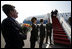 U.S. and Lithuanian officials line up on the tarmac to greet Vice President Dick Cheney and his wife, Lynne Cheney, upon their arrival Wednesday, May 3, 2006 to Vilnius, Lithuania. The Vice President's visit to Vilnius is the first stop in a three-nation, five-day trip that includes bilateral meetings with leaders of the Baltic and Black Sea regions at the Vilnius Conference 2006.