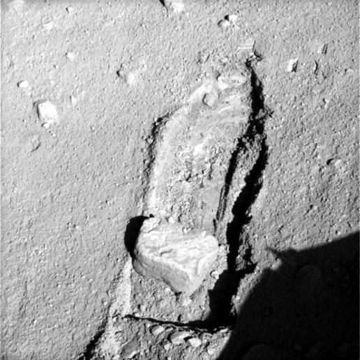 Rock Moved by Mars Lander Arm