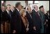 Vice President Dick Cheney and his wife, Lynne, attend the swearing-in ceremony for Afghanistan President Hamid Karzai at Salaam Khana in Kabul, Afghanistan, Dec. 7, 2004. President Karzai is Afghanistan.s first democratically-elected president in Afghanistan's history. Also pictured, from left back, Secretary of Defense Donald Rumsfeld, Afghanistan Vice President Hedayat Amin Arsala, left front; U.S. Ambassador to Afghanistan Zalmay Khalilzad, and Afghanistan President Hamid Karzai, right.