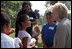 Lynne Cheney talks with a group of fourth graders from local Fairfax County public schools during a Constitution Day 2005 celebration at George Washington's Mount Vernon Estate Friday, September 16, 2005.