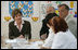 Mrs. Laura Bush listens to roundtable participants Friday, July 14, 2006 during a tour of the Pediatric HIV/AIDS Clinical Center of Russia in St. Petersburg.