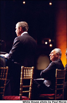 Shimon Peres, Israel's Minister of Foreign Affairs, listens to President Bush's remarks to the American Jewish Committee. White House photo by Paul Morse