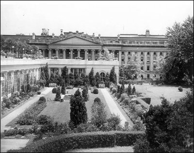 Pictured is an elevated view of the East Garden, the East Wing and Treasury Building, c. 1910. 