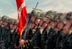 Welcoming President George W. Bush, marines carry the United States and Marine Corps flags at Camp Pendleton, Calif., May 29, 2001. "Camp Pendleton serves as the launching pad for what Marines do best.to deploy rapidly so you can be the first on the scene wherever freedom and America's interests are threatened," said the President. "Today, you carry forward this proud tradition, ready to answer when America calls."