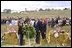 President George W. Bush and Laura Bush participate in a wreath-laying ceremony near the site of the crash where seven crew members and 33 passengers died when the plane crashed in Somerset County. Officials believe the plane was heading for a target in Washington, D.C., when the passengers fought back against the four hijackers.