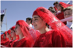 Georgian children in traditional dress join thousands of people gathered in Freedom Square to hear President Bush speak the President's in Tbilisi, Georgia, Tuesday, May 10, 2005. "As you build freedom in this country, you must know that the seeds of liberty you are planting in Georgian soil are flowering across the globe," said President Bush in his remarks." I have come here to thank you for your courage."