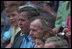 President Bush, Laura Bush, former President George Bush and the President's brother, Governor Jeb Bush, cheer on the players during the second Tee Ball game on the South Lawn on Sunday, June 3, 2001.