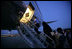 President George W. Bush boards Air Force One at Andrews Air Force Base Monday night, June 12, 2006, en route to Iraq. White House photo by Eric Draper 